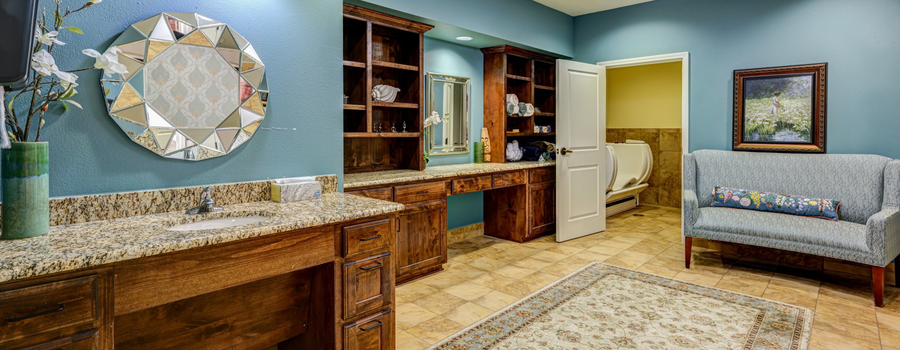 Room with couch and vanity