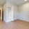 a room with white cabinets